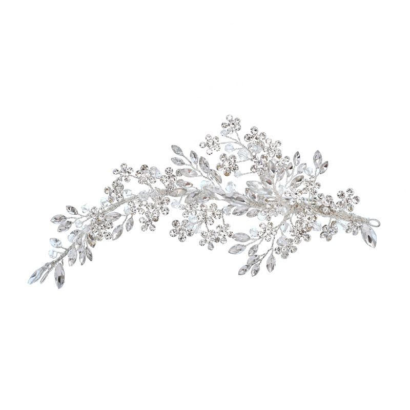 Crystal dusted flowers, stone set leaves and faceted crystal beading. Secured with crocodile clip at base. • High shine silver finish. • Dimensions 18cm x 8cm at widest point. Code 2034 - € 120