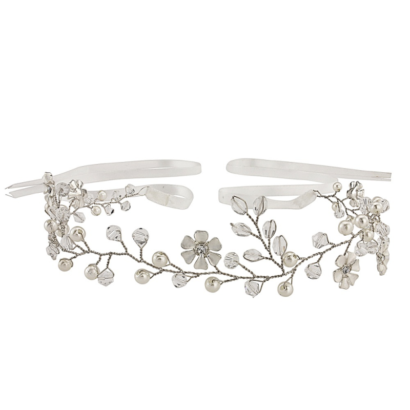 Floral romance hair vine in a chic and classic design, embellished with simulated ivory pearls and clear crystal beads on a silver finish and ivory ribbon. Can be worn as a brow band or headband. Size is approx 1cm wide and 37cm long - Code 1478 - € 80